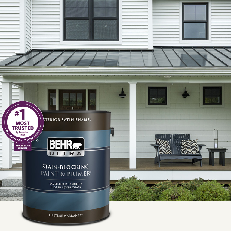 White house exterior with a can of Behr Ultra Exterior Satin Enamel in foreground Mobile