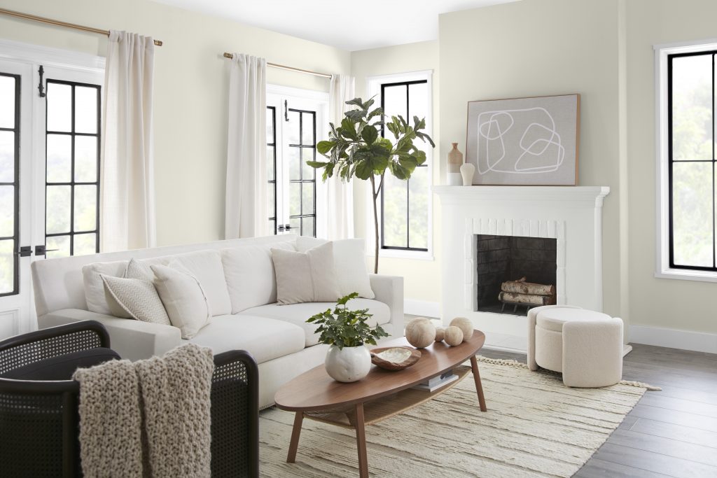 A living room with walls painted in white in a flat sheen