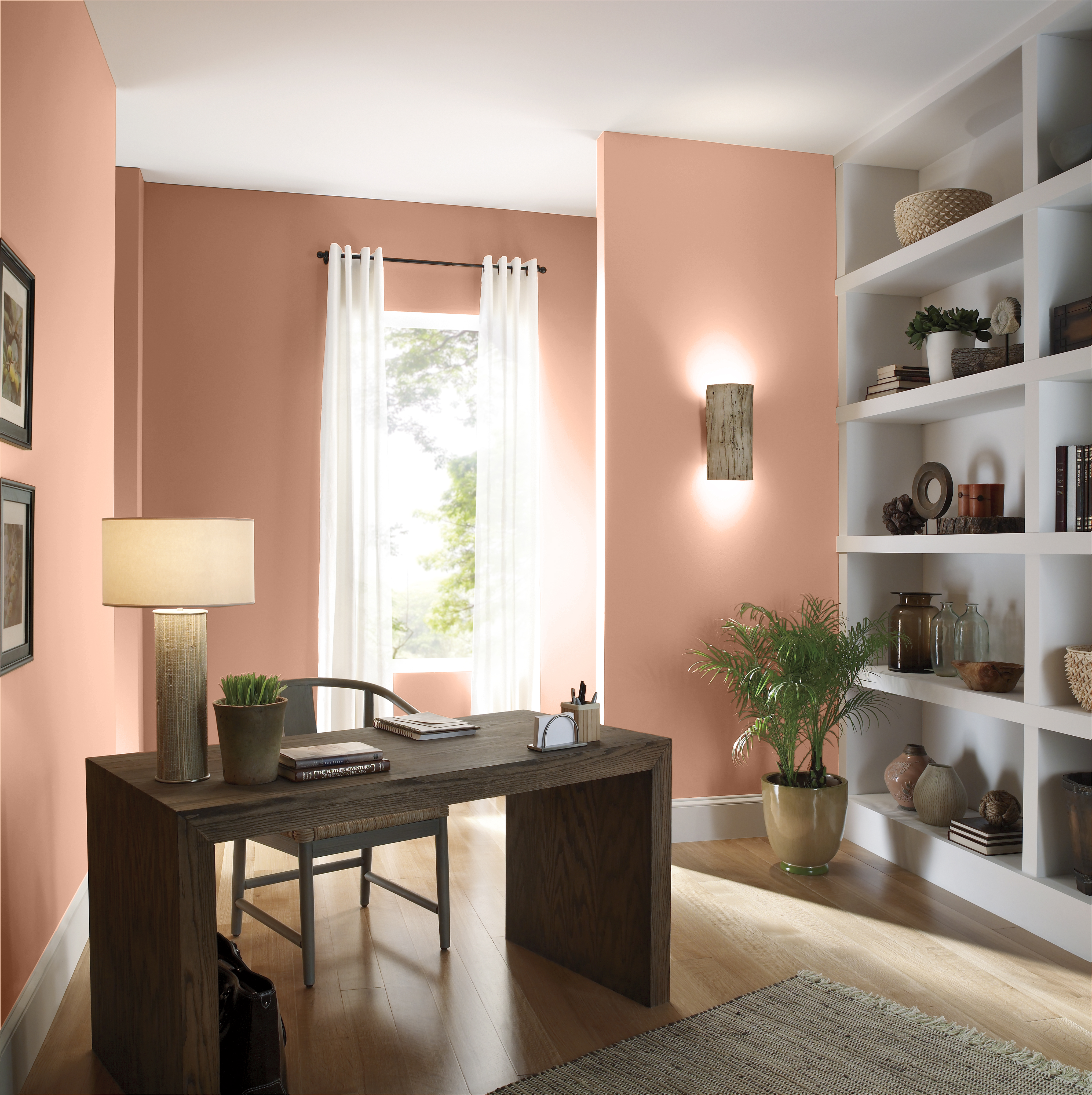 An office with light peach colour for the walls.)