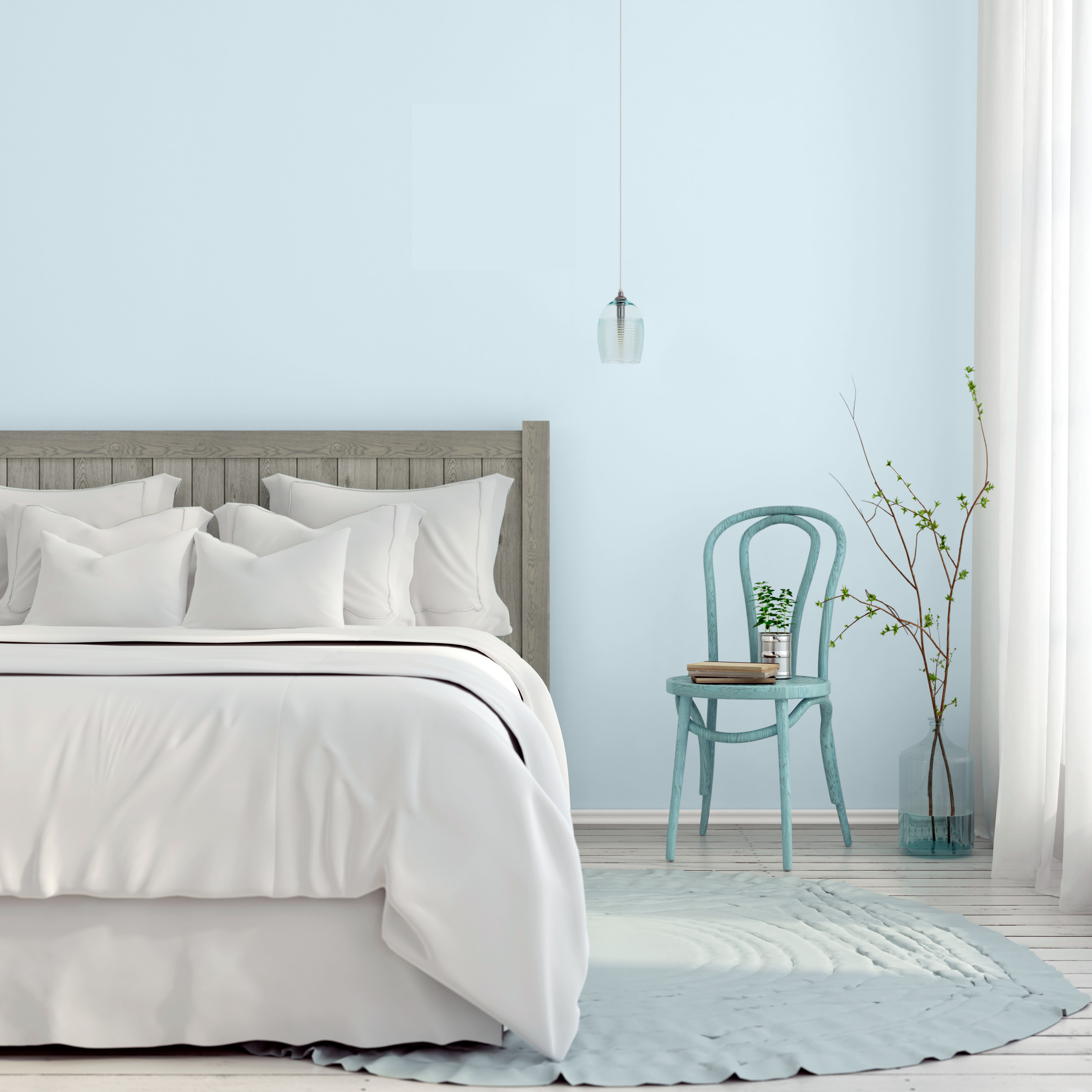 left image shows a relaxing bedroom with a bed, side chair and glass vase with some flowers. Right Image shows a warm dining room with a table, chairs and décor. 